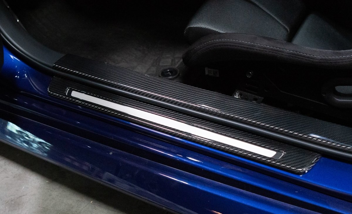 Revel GT Dry Carbon Door Sill Covers: Toyota GR86 (22+) & Subaru BRZ (22+)