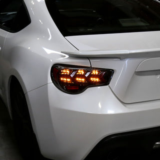 Spec D Lambo Style Sequential LED Tail Lights (Glossy Black /Clear Lens): Scion FRS & Subaru BRZ 2013 - 2016