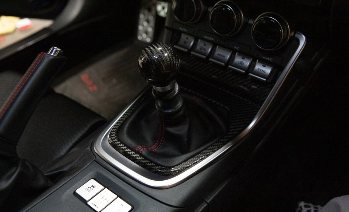 Revel GT Dry Carbon Manual Transmission Shifter Panel Cover: Toyota GR86 (22-26) & Subaru BRZ (22-26)